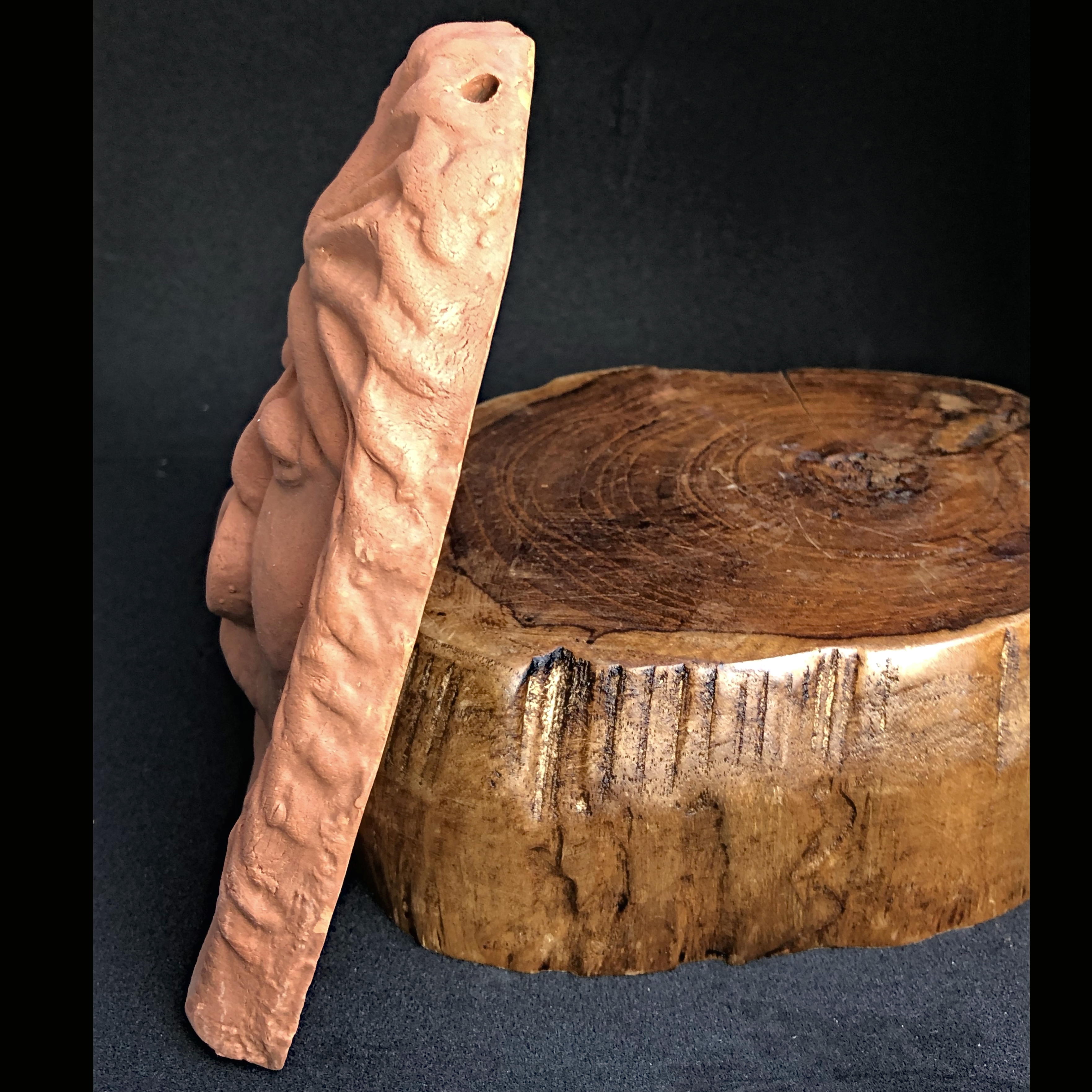 Antique roof tile- antefix